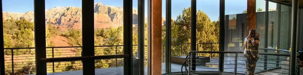 Glass-walled common area at Ambiente hotel in Sedona